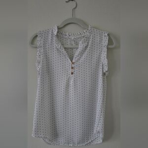 Small DNA Couture white blouse with Navy colored polka dots!